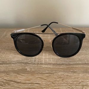 Black and gold sunglasses